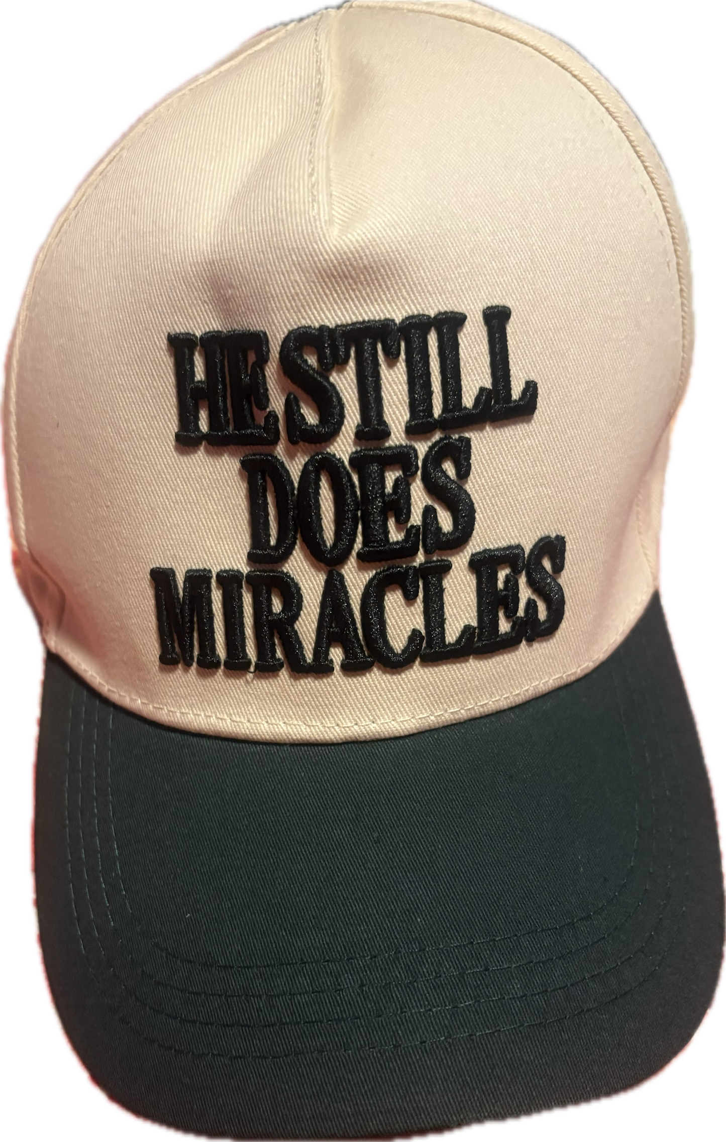 He Still Does Miracles Trucker Hat